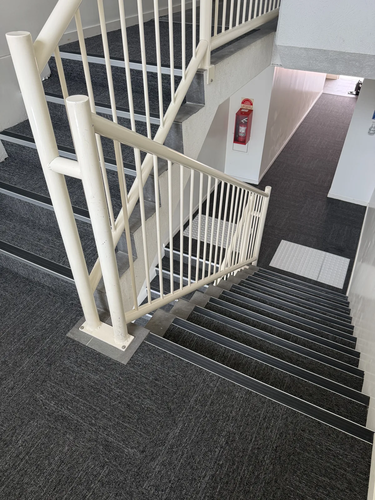 Flooring compliance upgrade to residential stairwell